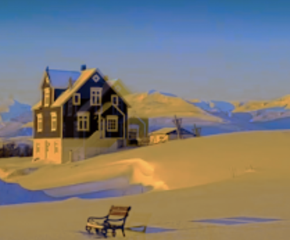A snowy landscape including a wooden bench in the foreground, a house in the middle distance, and then a backdrop of mountains. There are great contrasts of golden light where sunrays fall and then blue shadows.