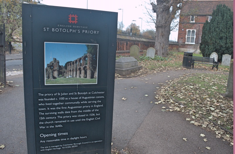 A sign in front of a building
