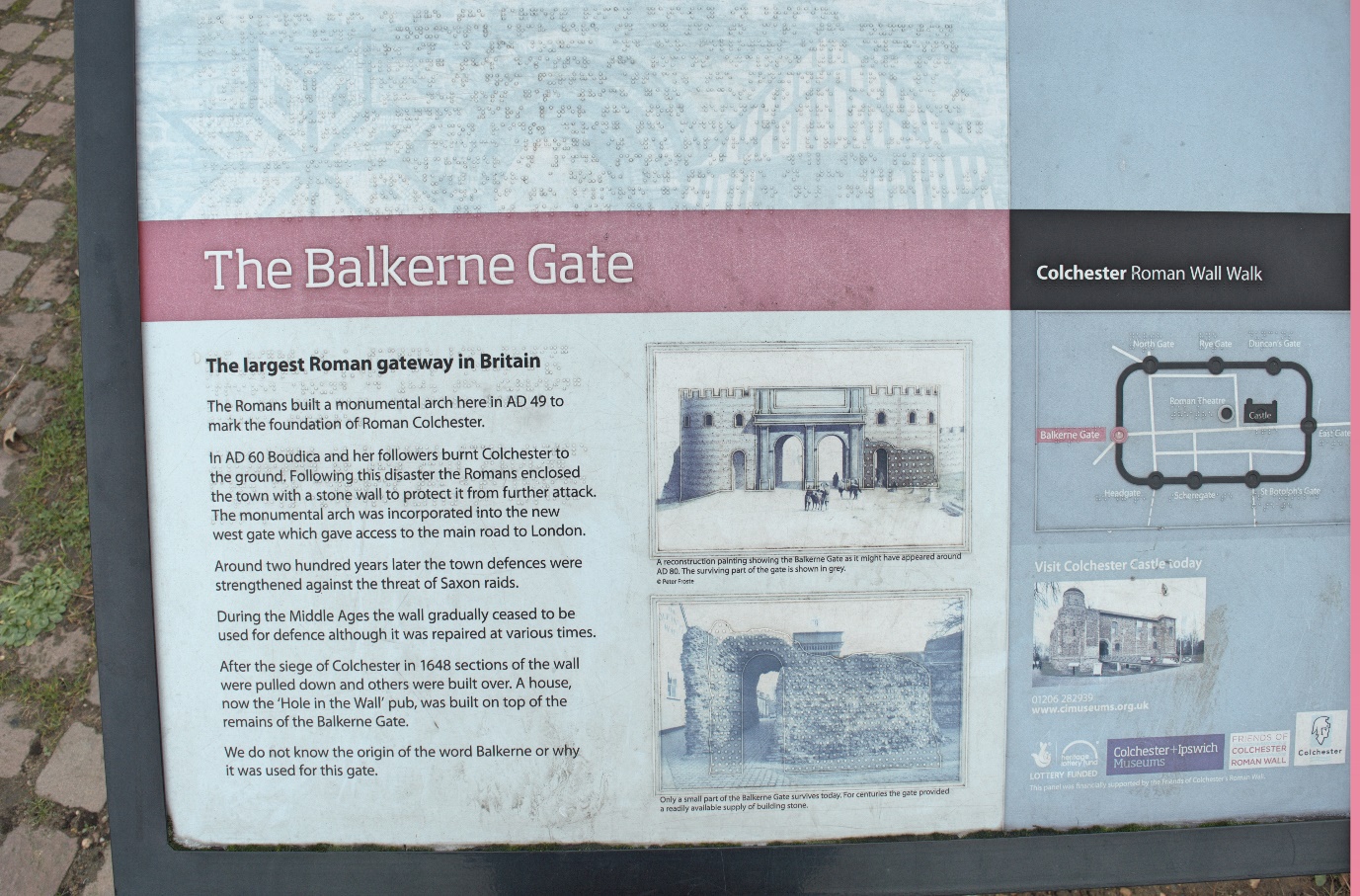 A close-up of sign introduce the Balkerne Gate