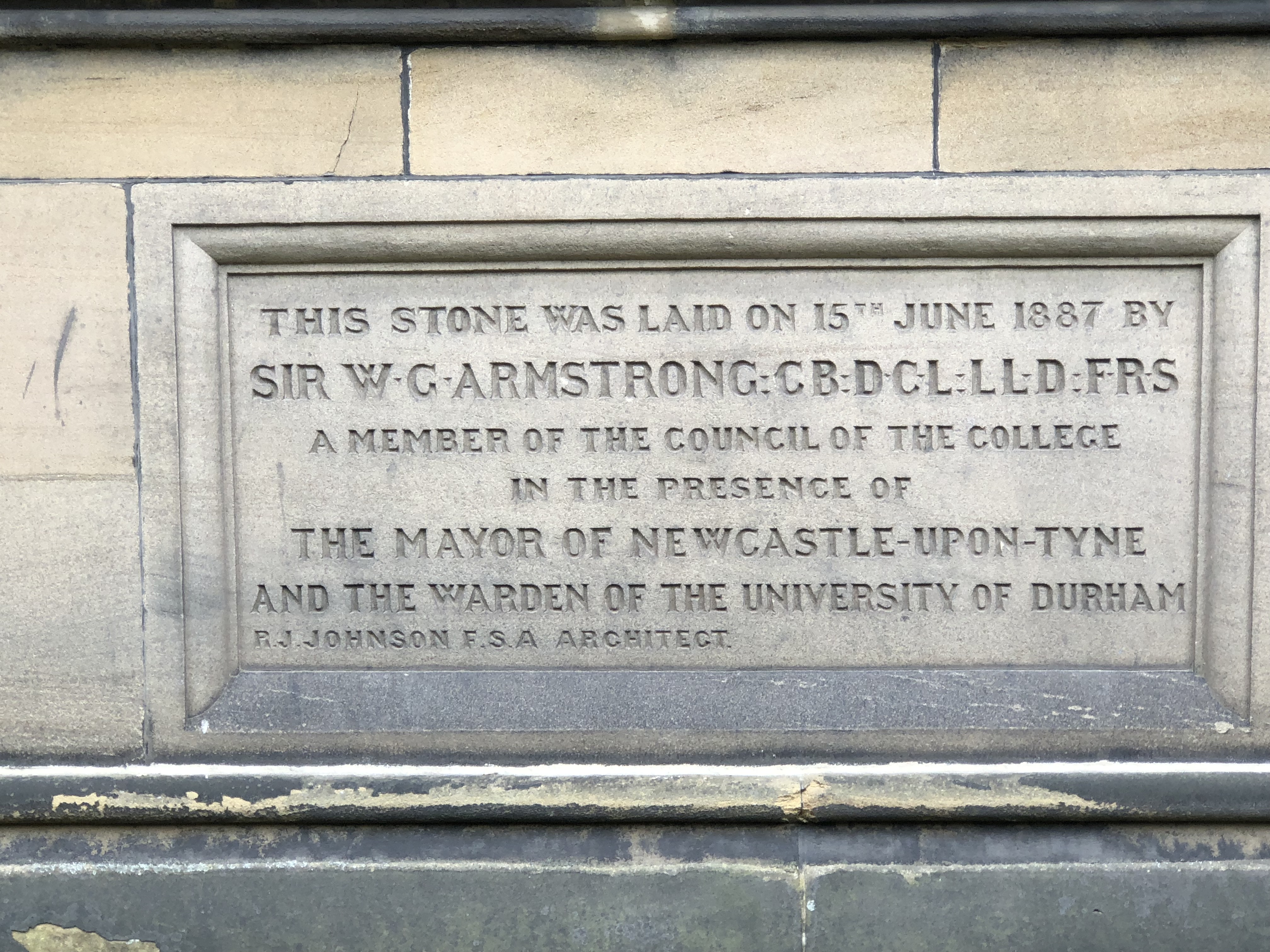 A stone plaque with text on it AI-generated content may be incorrect.
